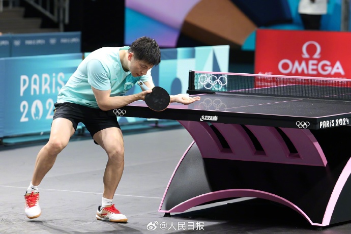 國乒賽前訓(xùn)練現(xiàn)場圖。人民日報記者 陶相安攝